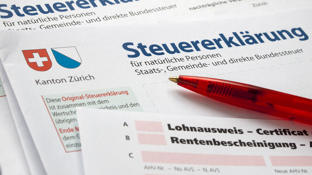 Close up of swiss tax form with red pencil
